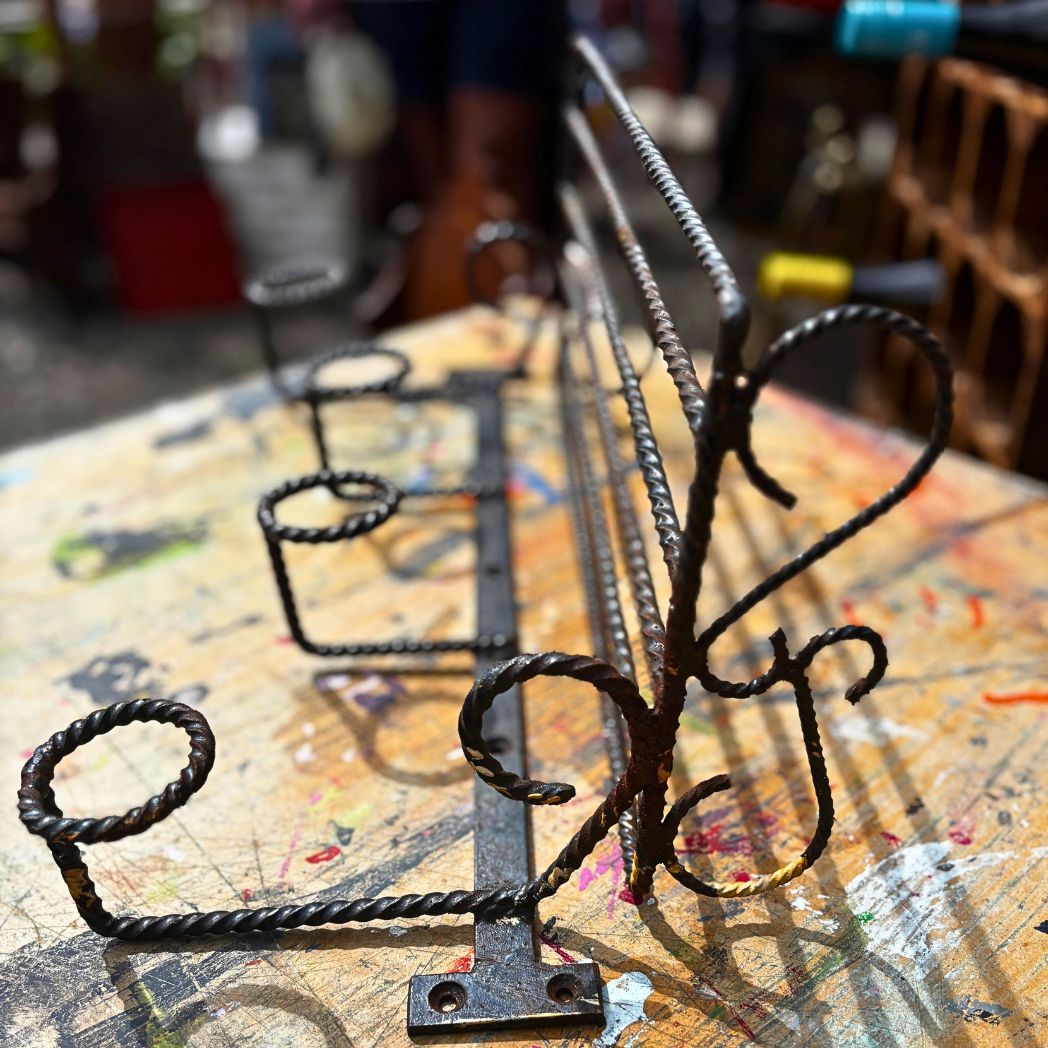Vintage wrought iron coat rack